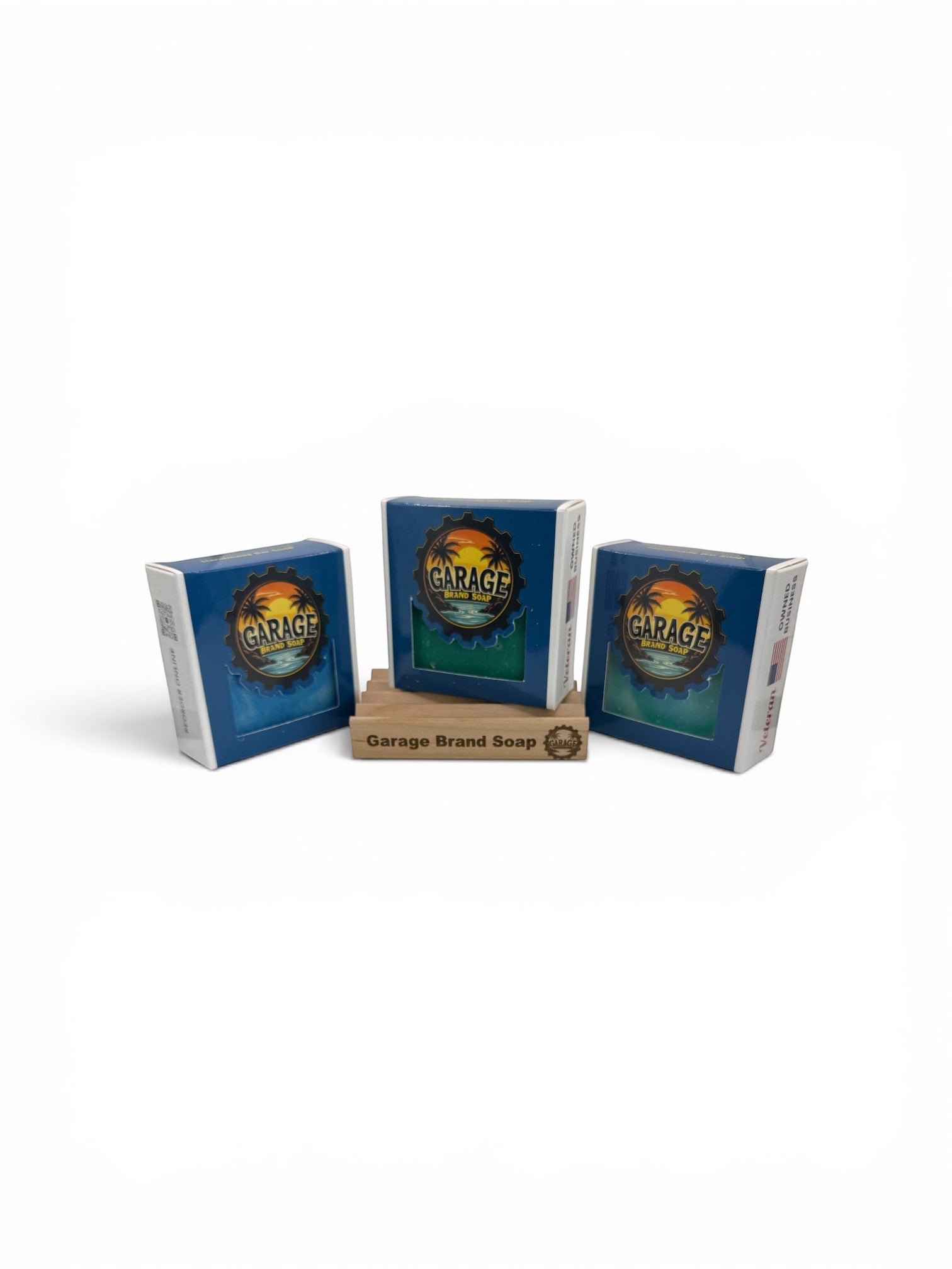 Garage Brand Soap starter bundle with three boxed soaps and a laser-engraved wooden soap dish on a white background